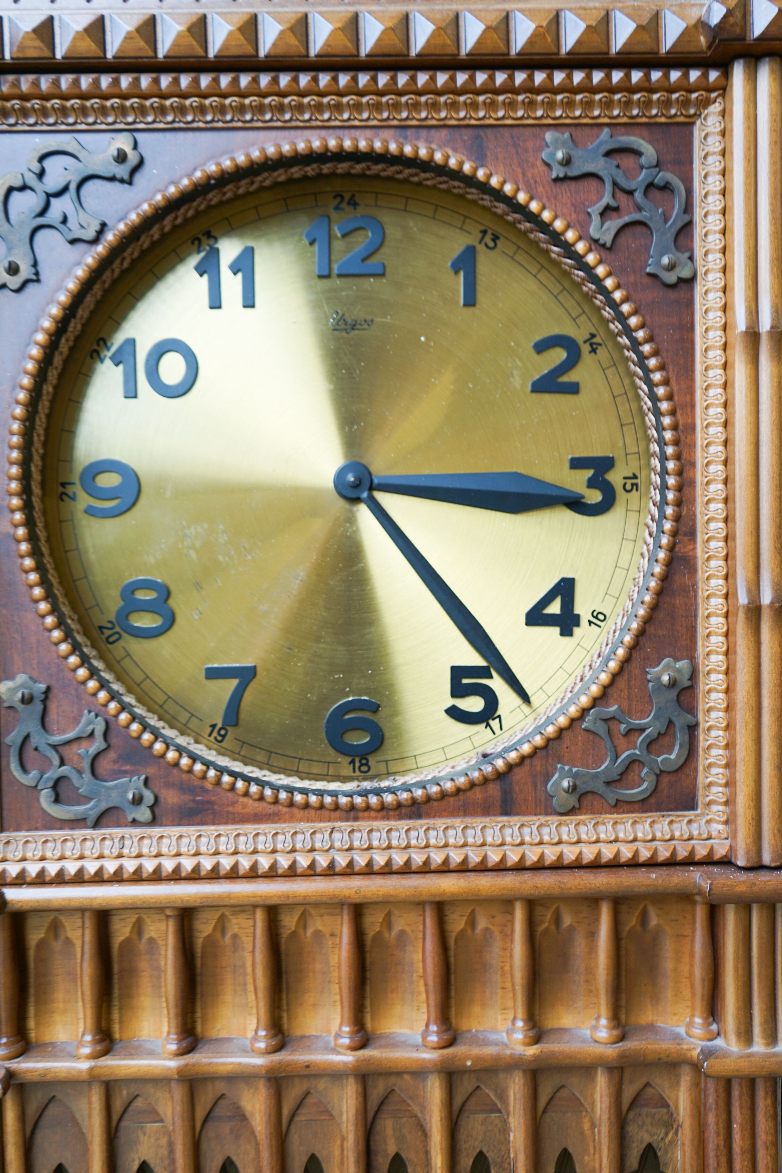 A mid 20th century architectural longcase clock, dial marked, 'Urgos', height 248cm